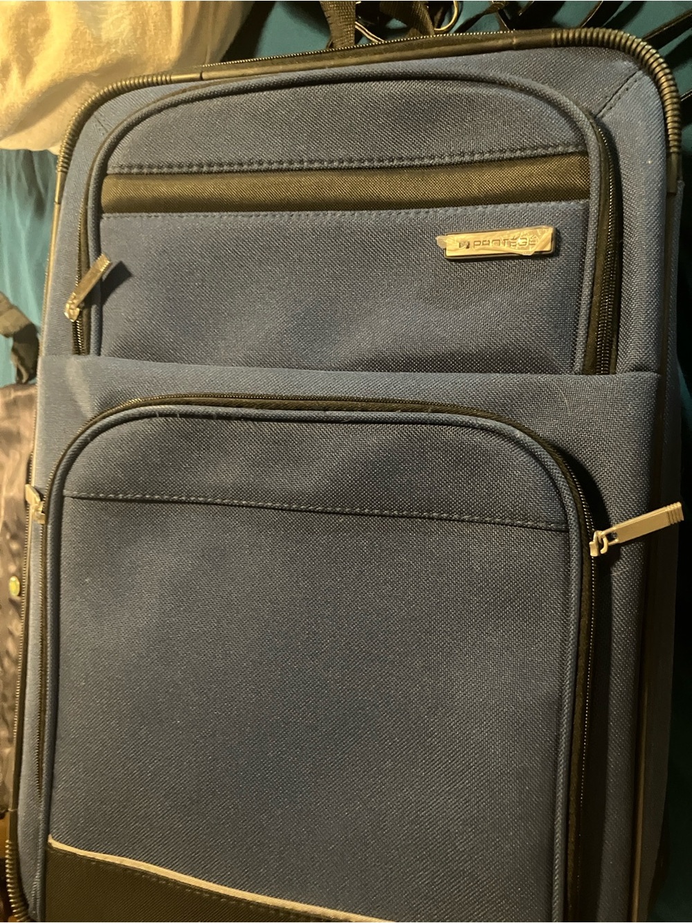 Protege carry on suitcase never used , 20”x14”x7” , blue with black trim